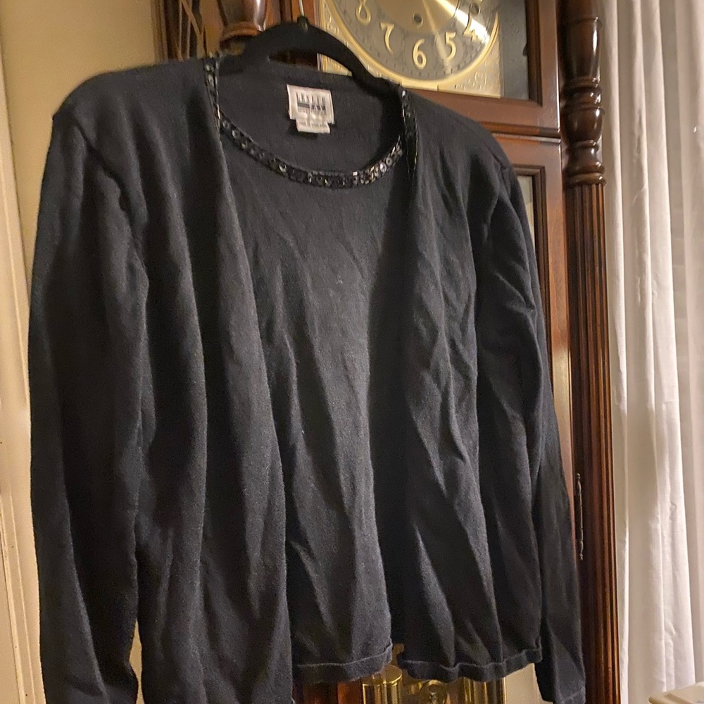 Love this black dress sweater with built in shell